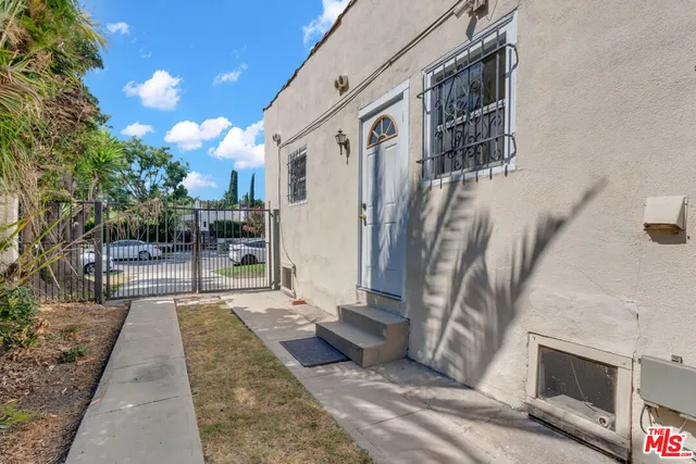 a house with yard in front of it