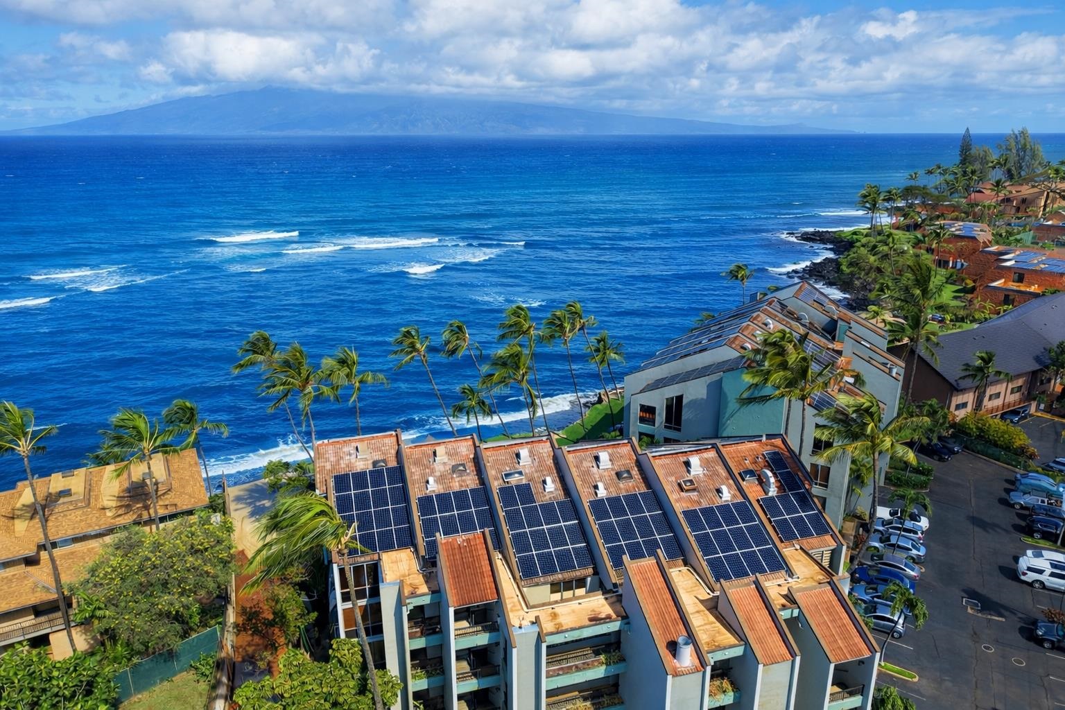 a view of a swimming pool with an outdoor seating