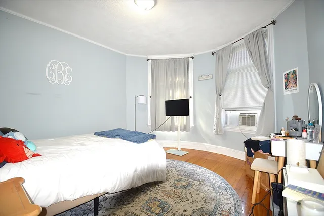 a bed room with a bed and a couch