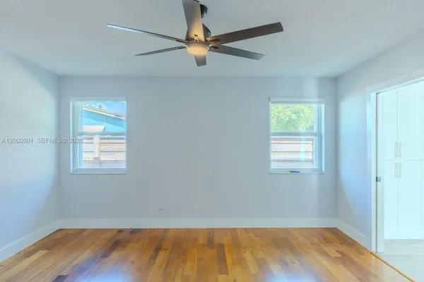 a view of a swimming pool with a yard