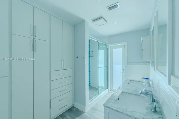 a view of swimming pool with outdoor seating