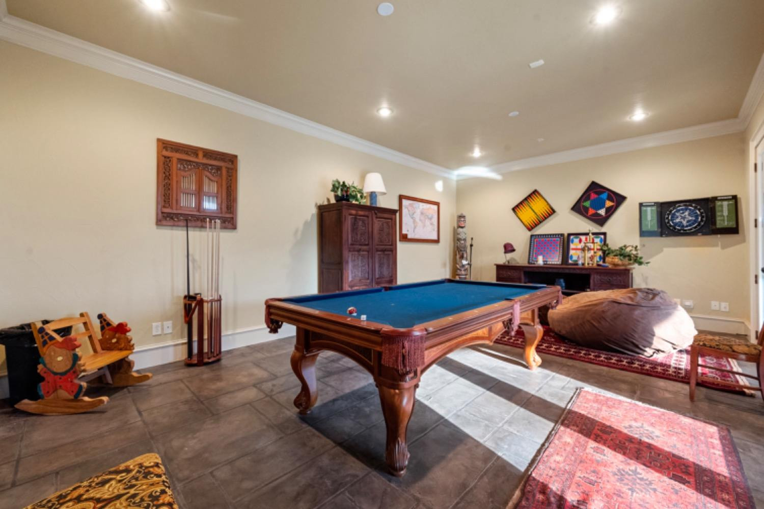 5631 Woodrow Road Lubbock, TX 79424 - Photo 28 of 50 a living room with furniture and a pool table