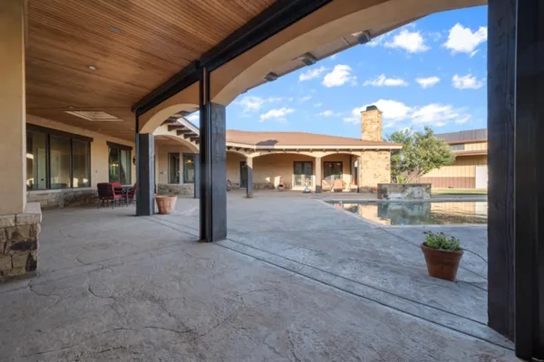 a view of a porch with seating space