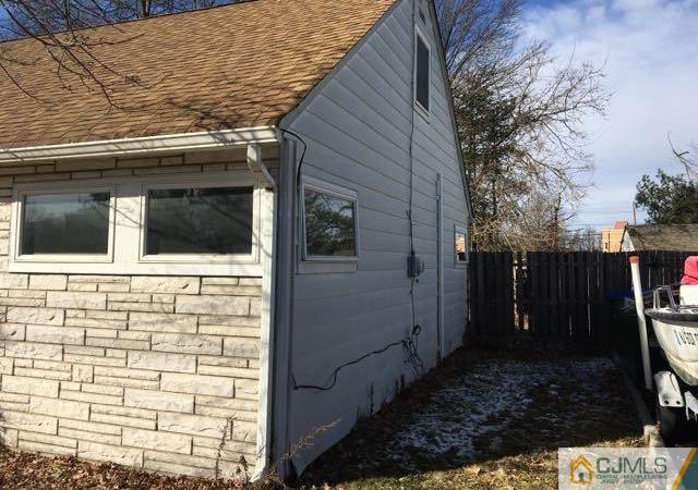 13 Sturgis Road Edison, NJ 08817 - Photo 2 of 22 a backyard of a house