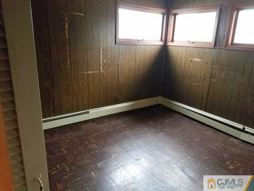 13 Sturgis Road Edison, NJ 08817 - Photo 21 of 22 a view of an empty room with a window