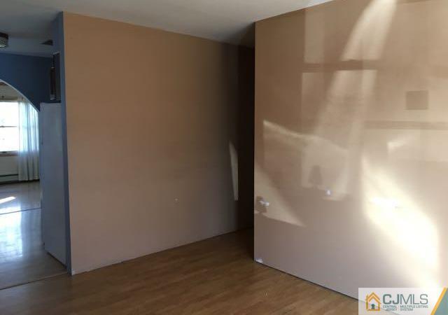 13 Sturgis Road Edison, NJ 08817 - Photo 5 of 22 a view of an empty room