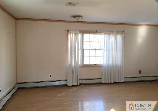 13 Sturgis Road Edison, NJ 08817 - Photo 7 of 22 a view of an empty room with a window