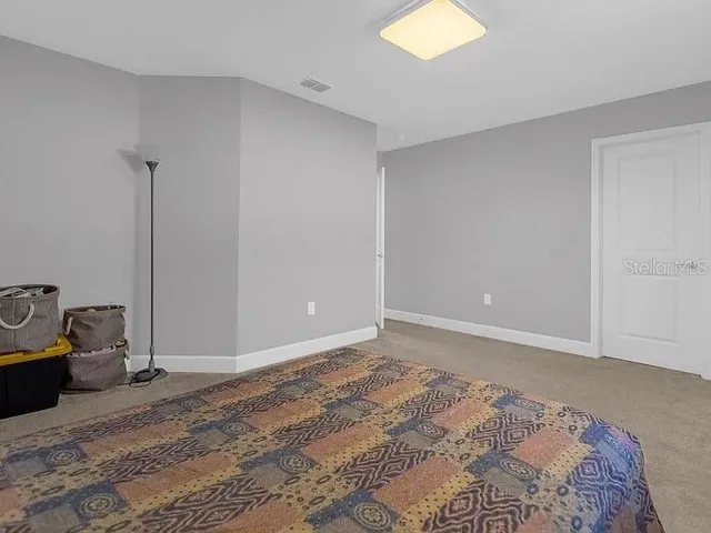 a view of a room with window and ample daylight