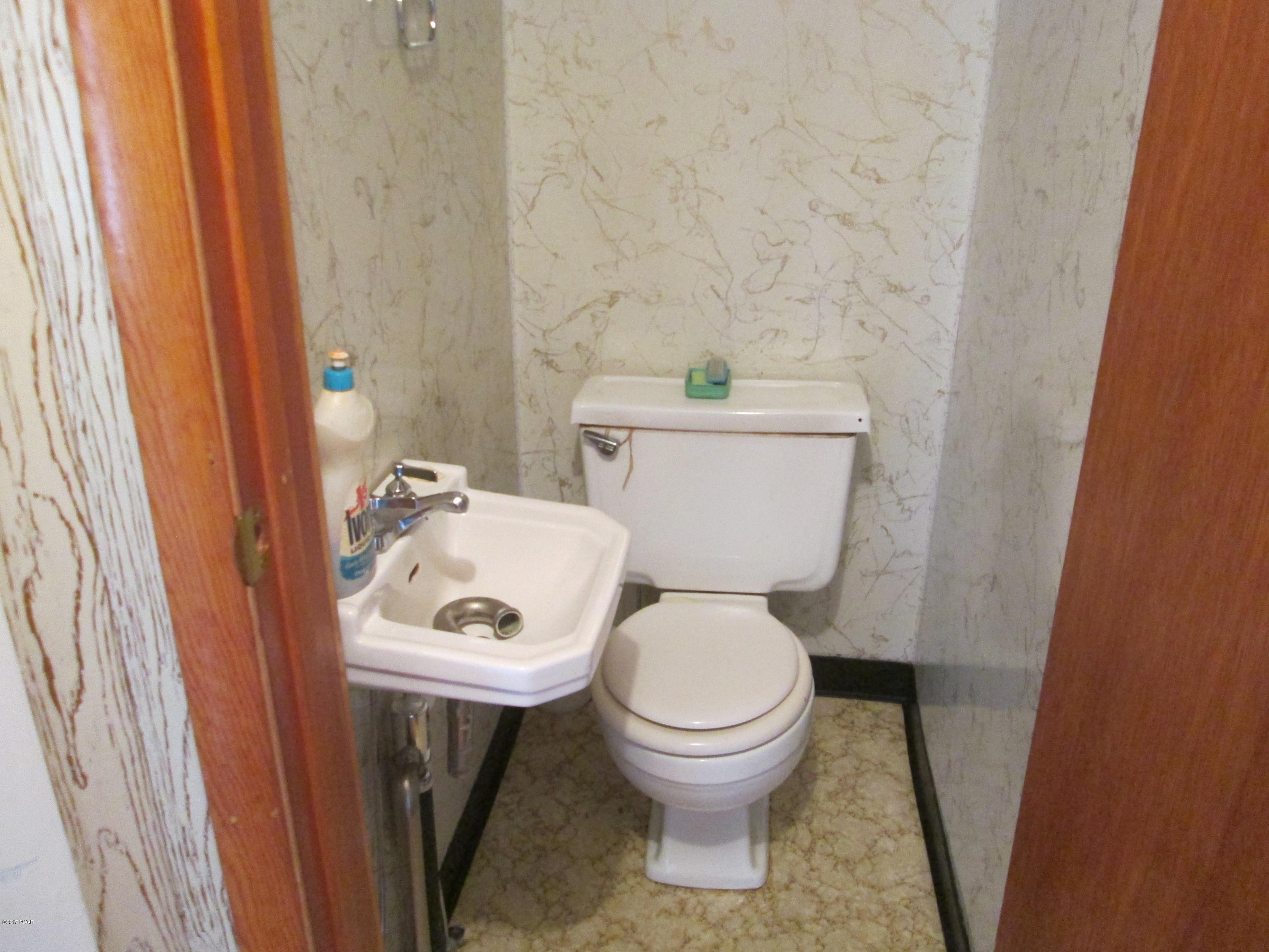 86 Beaver Hollow Road Lakewood, PA 18439 - Photo 13 of 30 a bathroom with a sink and a toilet