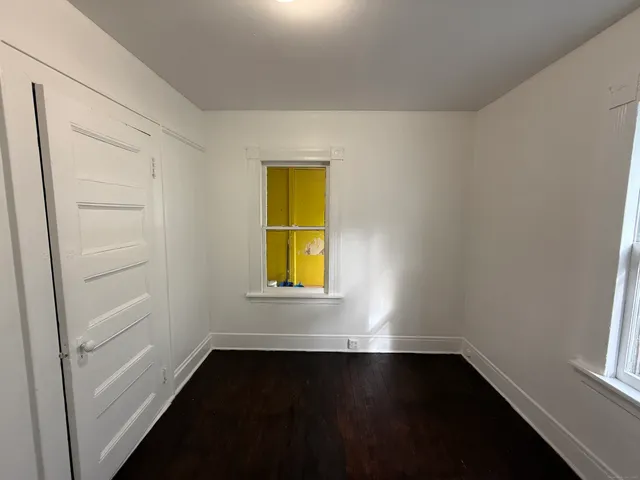an empty room with windows