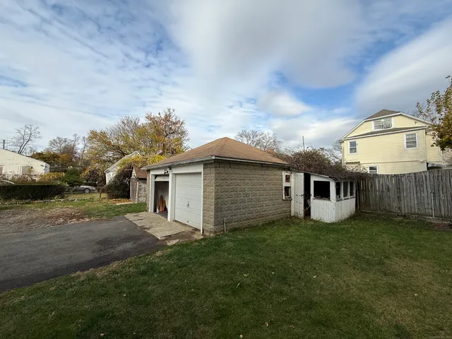 a view of a yard in front of a house with a yard