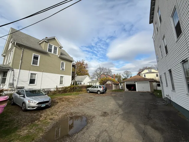 a view of a street with cars