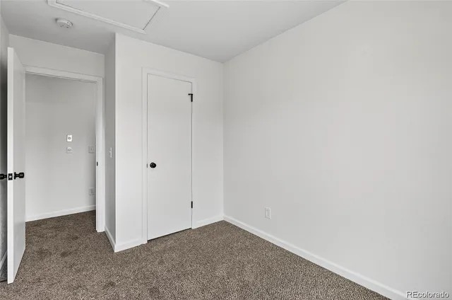 a view of a room that has a window in it