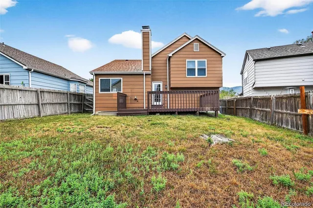 a view of balcony with wooden floor