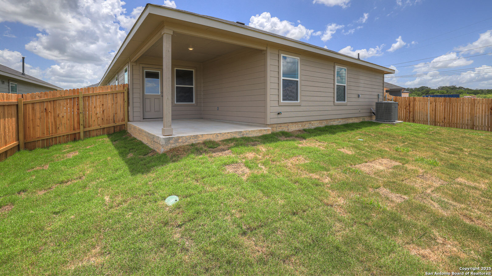 322 Hodges Street Maxwell, TX 78656 - Photo 29 of 34 a view of a backyard with wooden fence