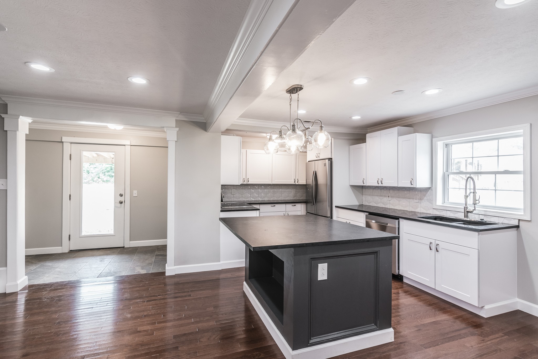 1267 Smiley Troutt Road Bethpage, TN 37022 - Photo 16 of 34 a kitchen with kitchen island a sink stainless steel appliances and cabinets