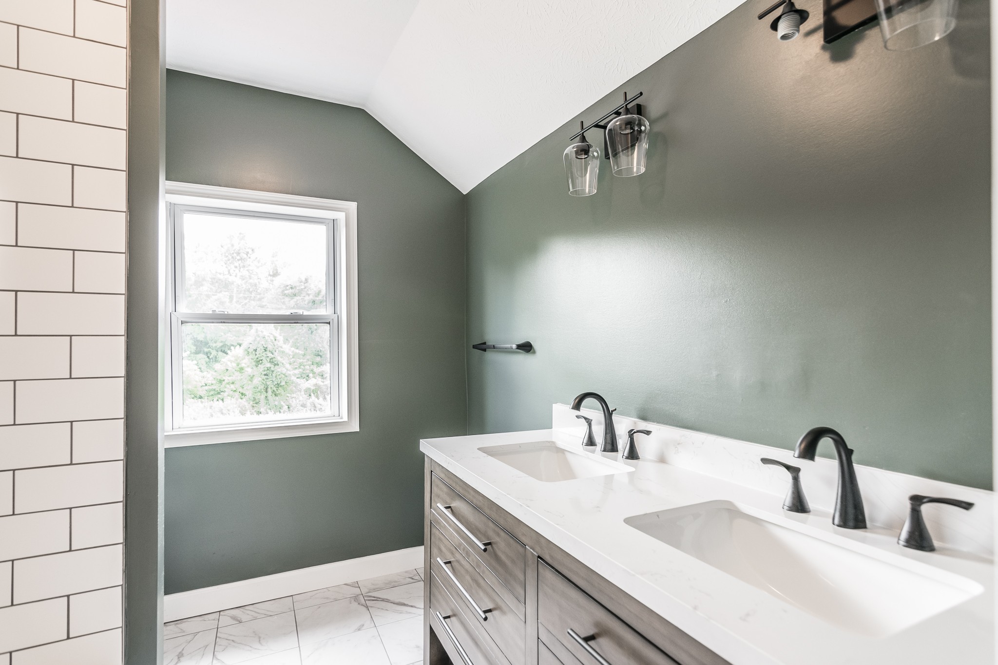 1267 Smiley Troutt Road Bethpage, TN 37022 - Photo 31 of 34 a bathroom with a sink vanity and mirror