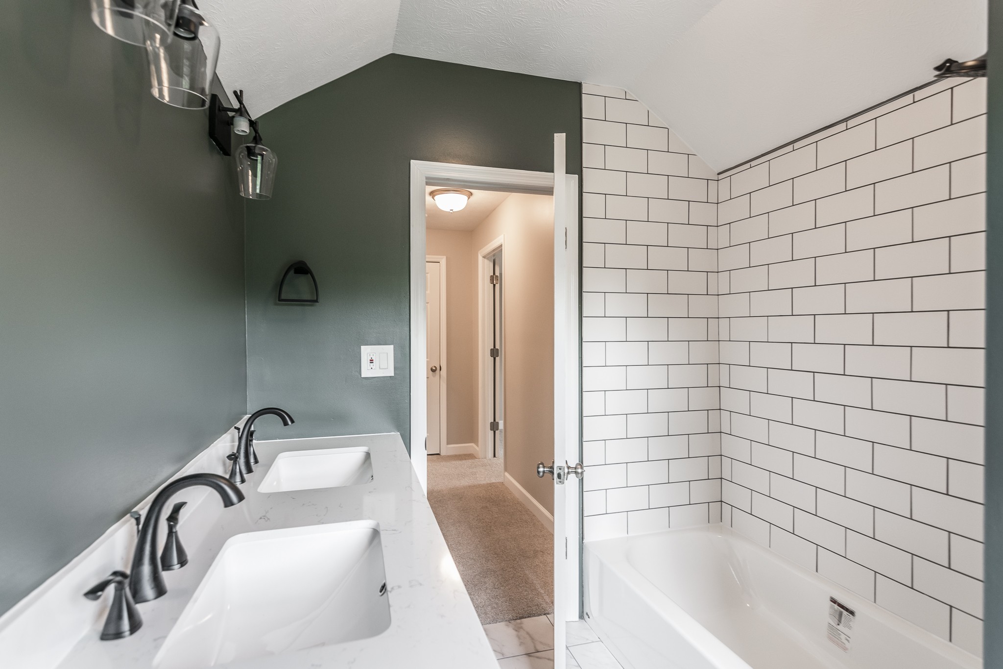 1267 Smiley Troutt Road Bethpage, TN 37022 - Photo 32 of 34 a bathroom with a bathtub and shower