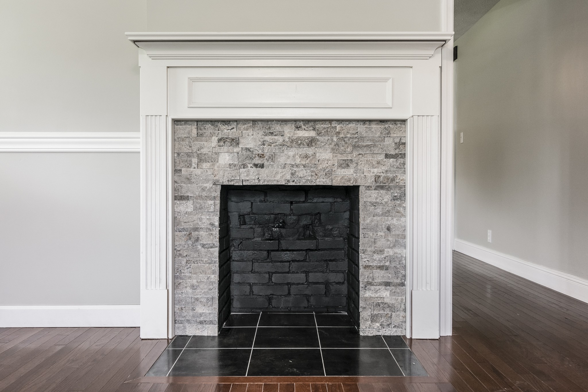 1267 Smiley Troutt Road Bethpage, TN 37022 - Photo 6 of 34 a living room with a fireplace and a potted plant