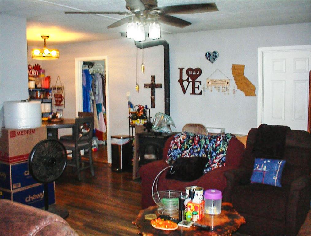 38152 Ruth Hill Road Squaw Valley, CA 93675 - Photo 14 of 25 a living room with furniture and wooden floor