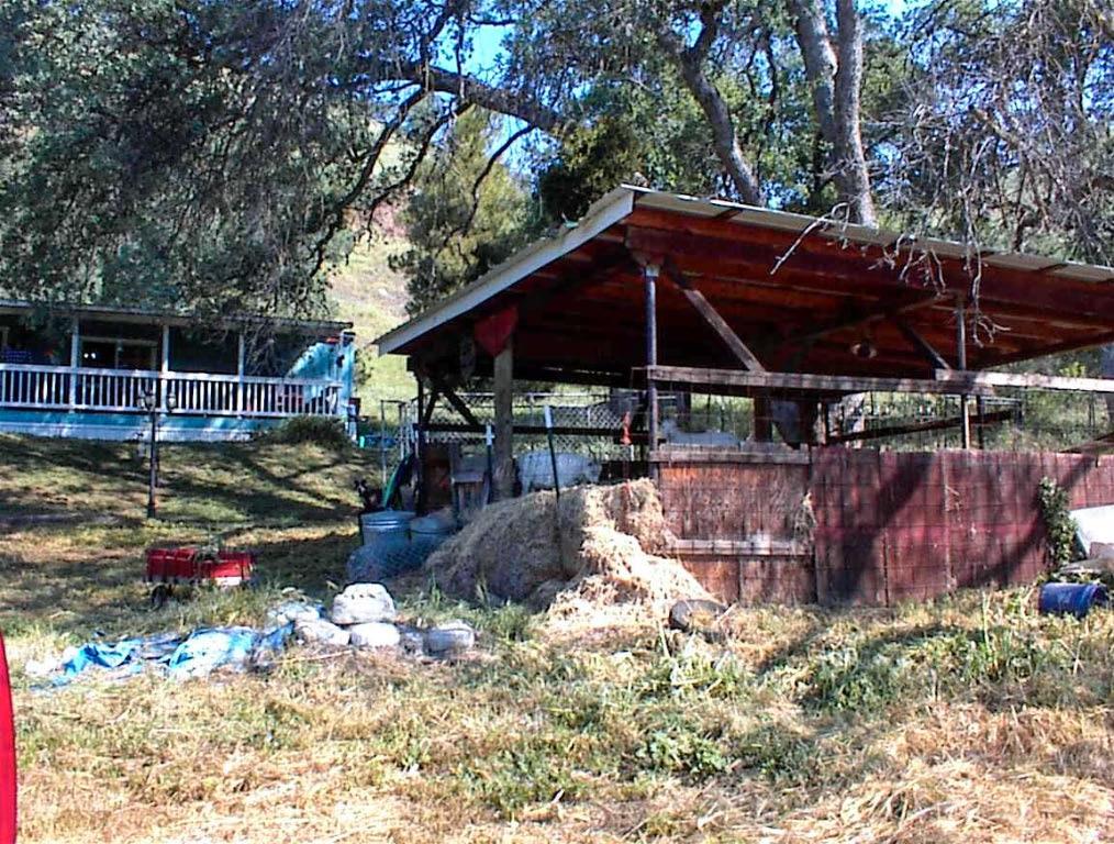 38152 Ruth Hill Road Squaw Valley, CA 93675 - Photo 6 of 25 a view of a backyard with wooden fence