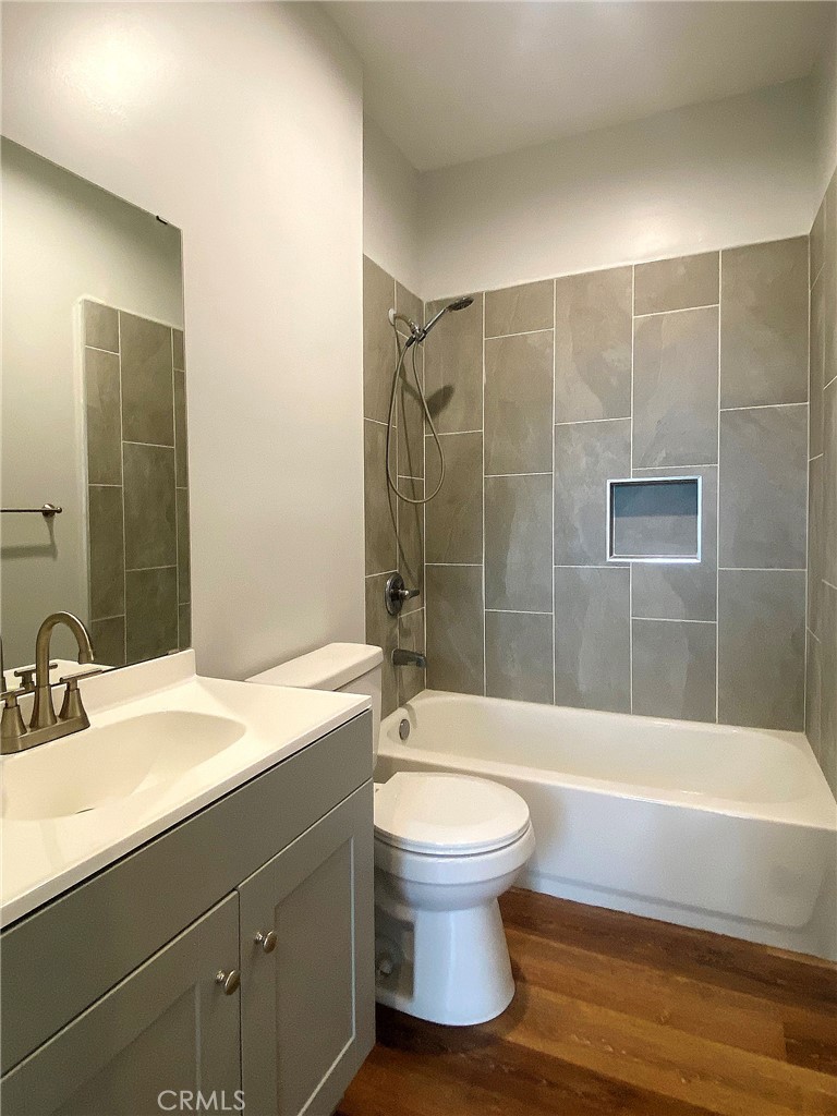 300 East Alhambra Road, Unit F Alhambra, CA 91801 - Photo 13 of 20 a bathroom with a sink toilet and shower
