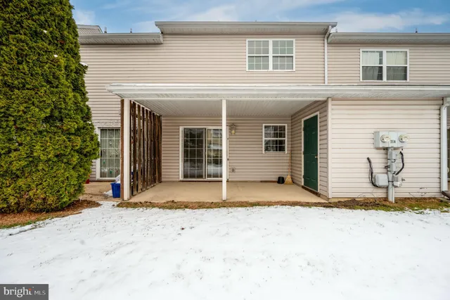 a house with trees in front of it