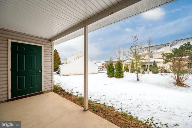 a view of a house with a large window