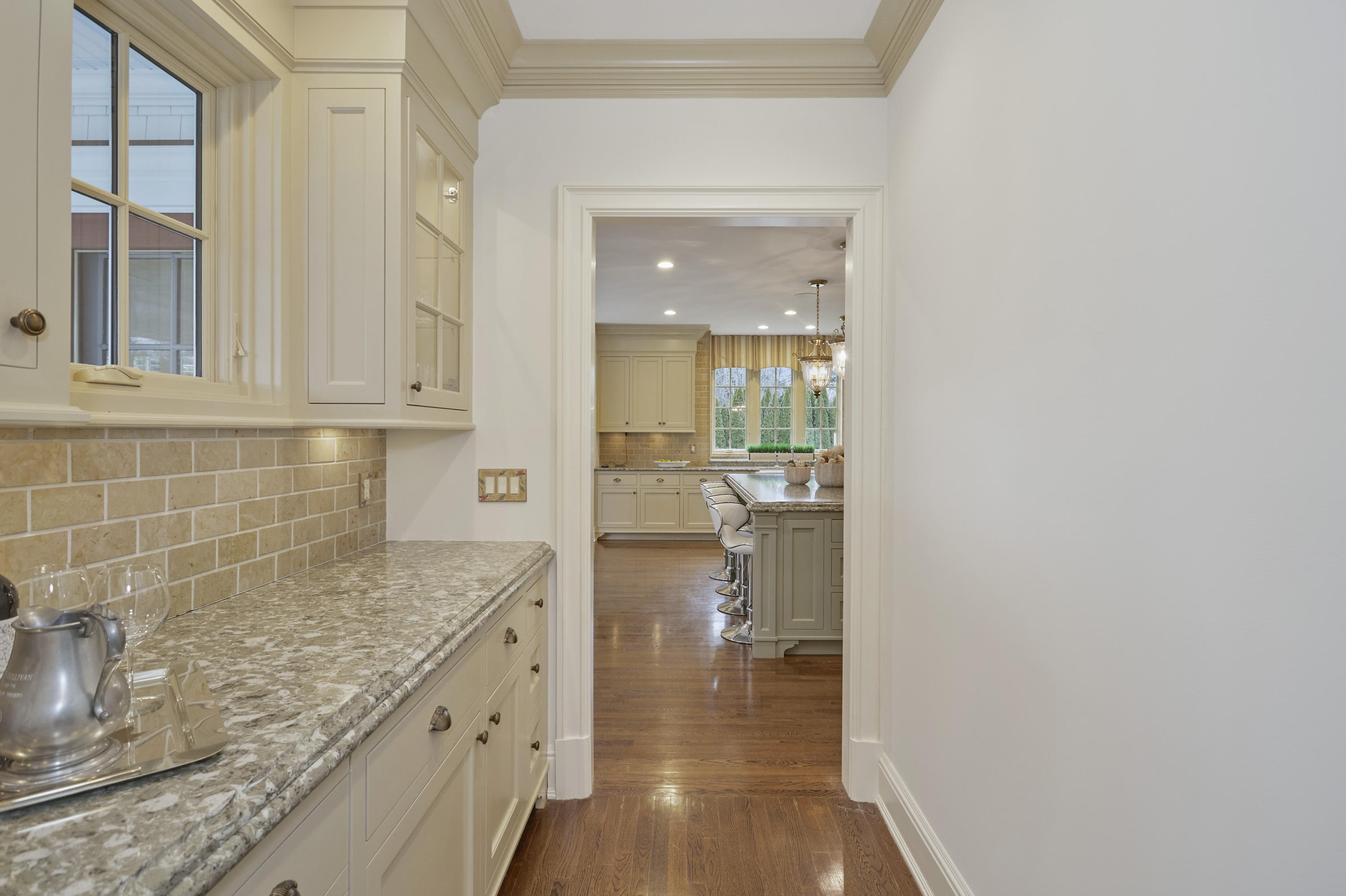 366 Brookside Road Darien, CT 06820 - Photo 12 of 40 a view of a kitchen cabinets and a counter place