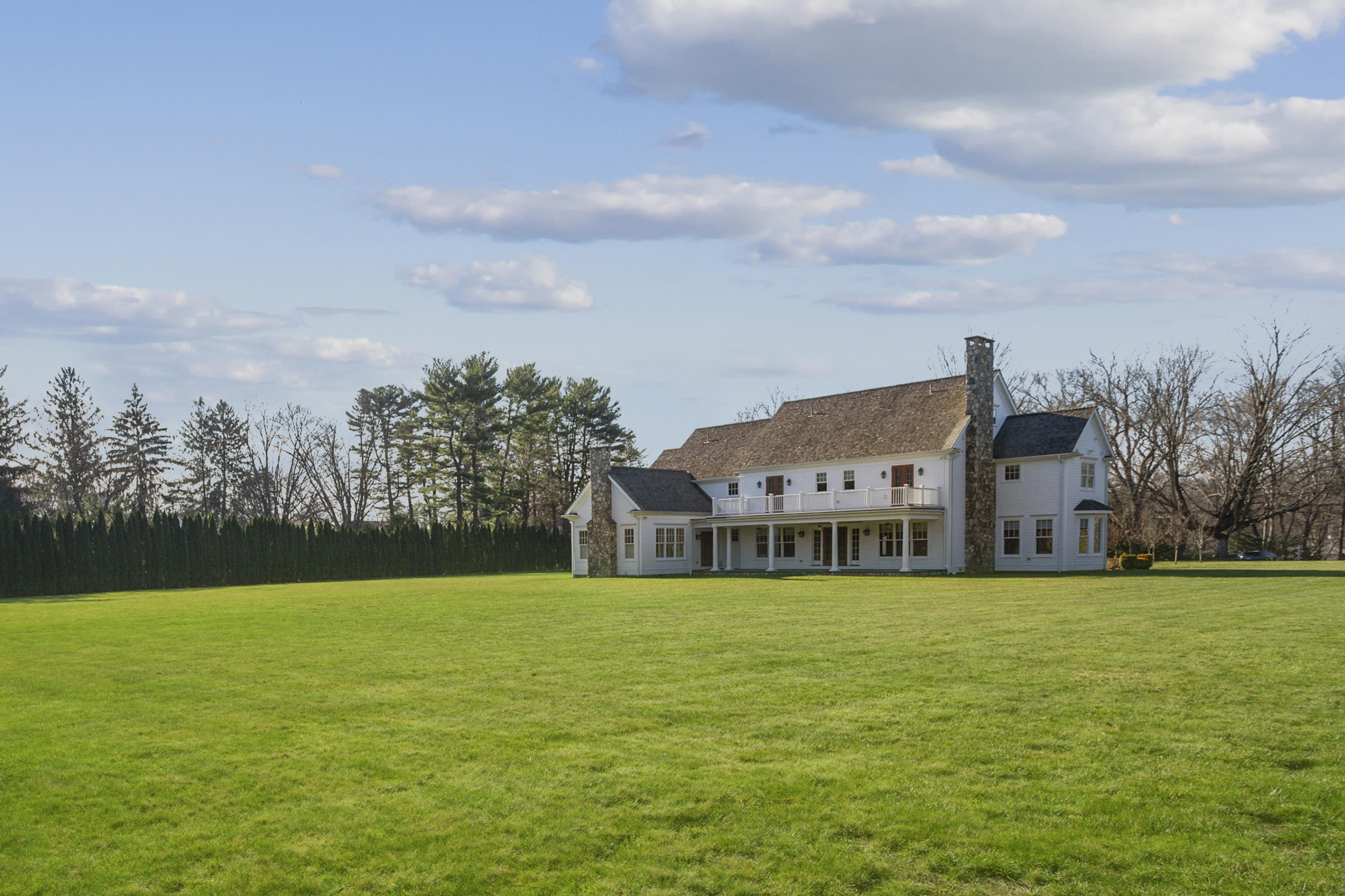 366 Brookside Road Darien, CT 06820 - Photo 35 of 40 a aerial view of residential houses with outdoor space and trees