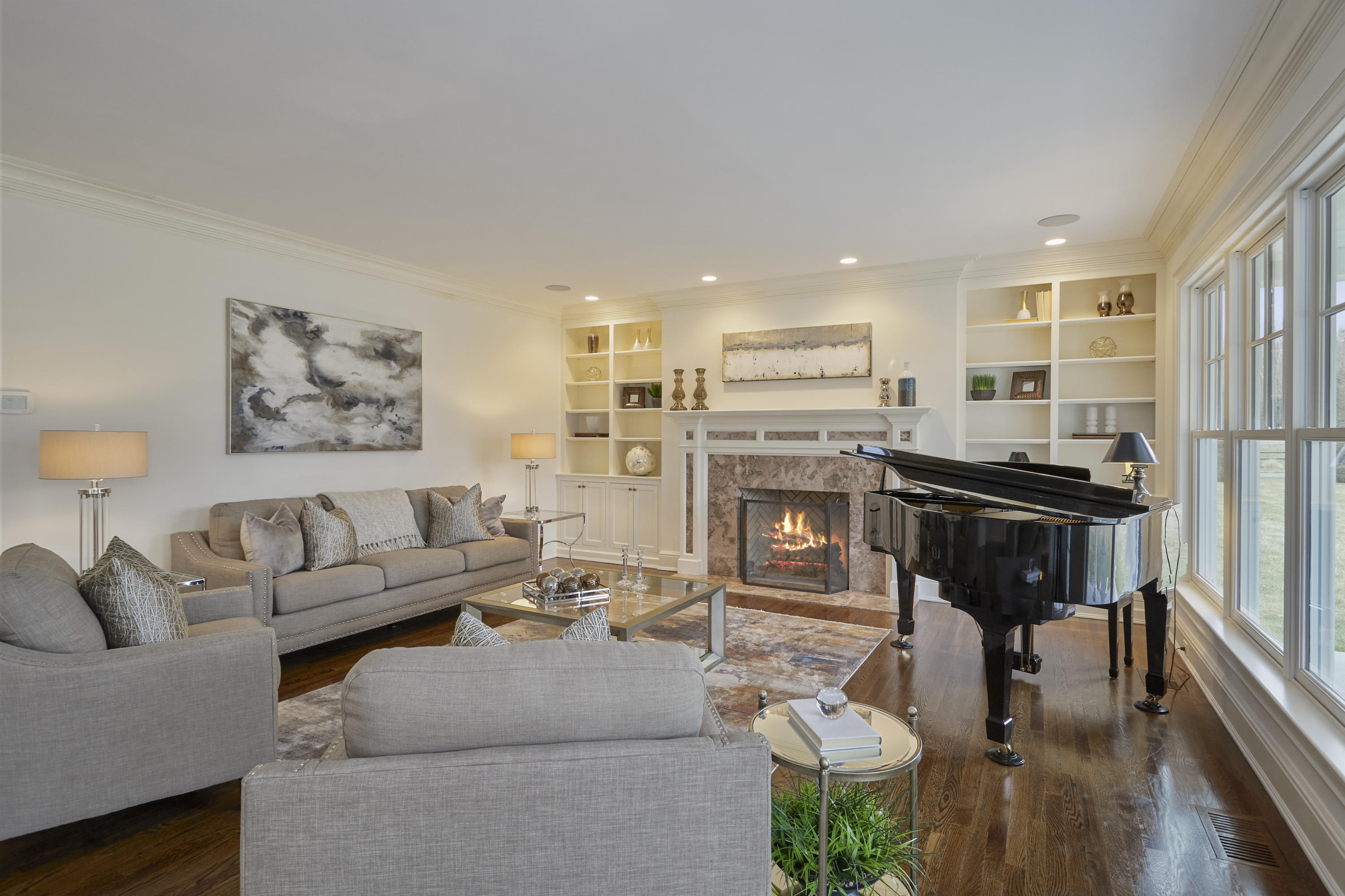 366 Brookside Road Darien, CT 06820 - Photo 9 of 40 a living room with furniture and wooden floor
