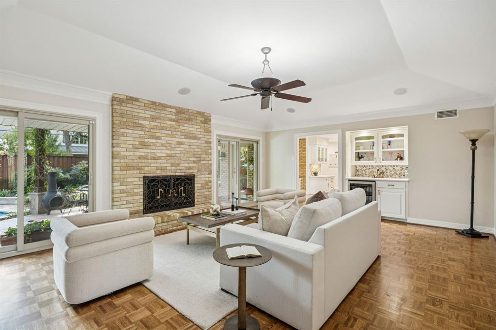 4708 Sugar Mill Road Dallas, TX 75244 - Photo 17 of 23 a living room with furniture fireplace and a large window
