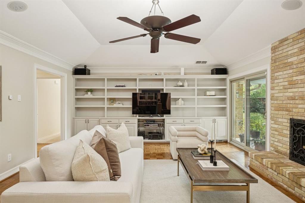 4708 Sugar Mill Road Dallas, TX 75244 - Photo 19 of 23 a living room with furniture and a flat screen tv