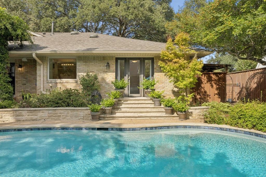 4708 Sugar Mill Road Dallas, TX 75244 - Photo 22 of 23 front view of a house with a yard