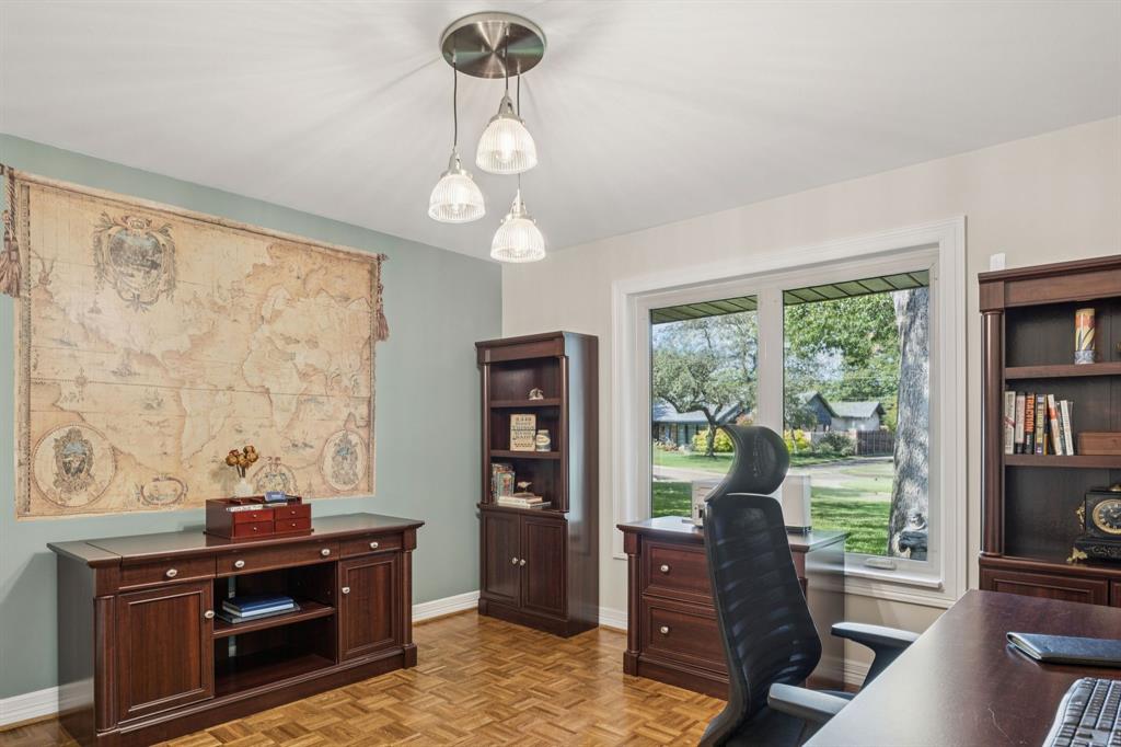 4708 Sugar Mill Road Dallas, TX 75244 - Photo 10 of 23 a view of a workspace with furniture and a window