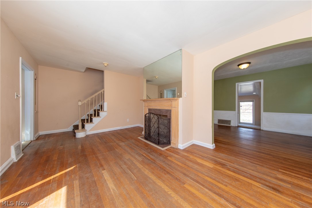 4071 Ellison Road Cleveland, OH 44121 - Photo 4 of 26 The Living Room, and looking through the archway to the dining room beyond