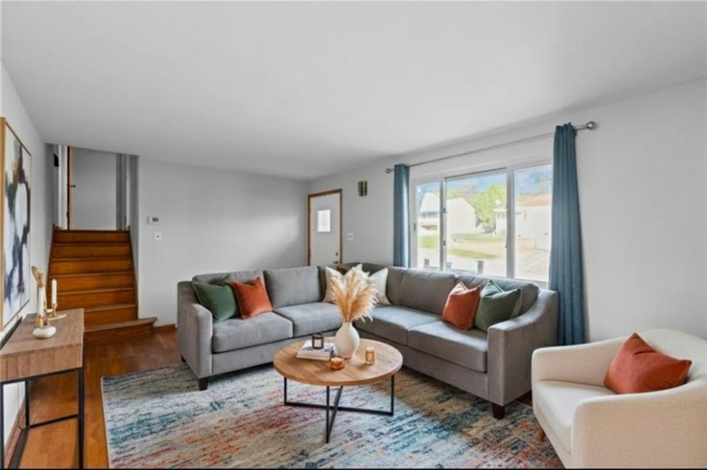 1210 Linden Street Cheswick, PA 15024 - Photo 2 of 31 a living room with furniture and a rug