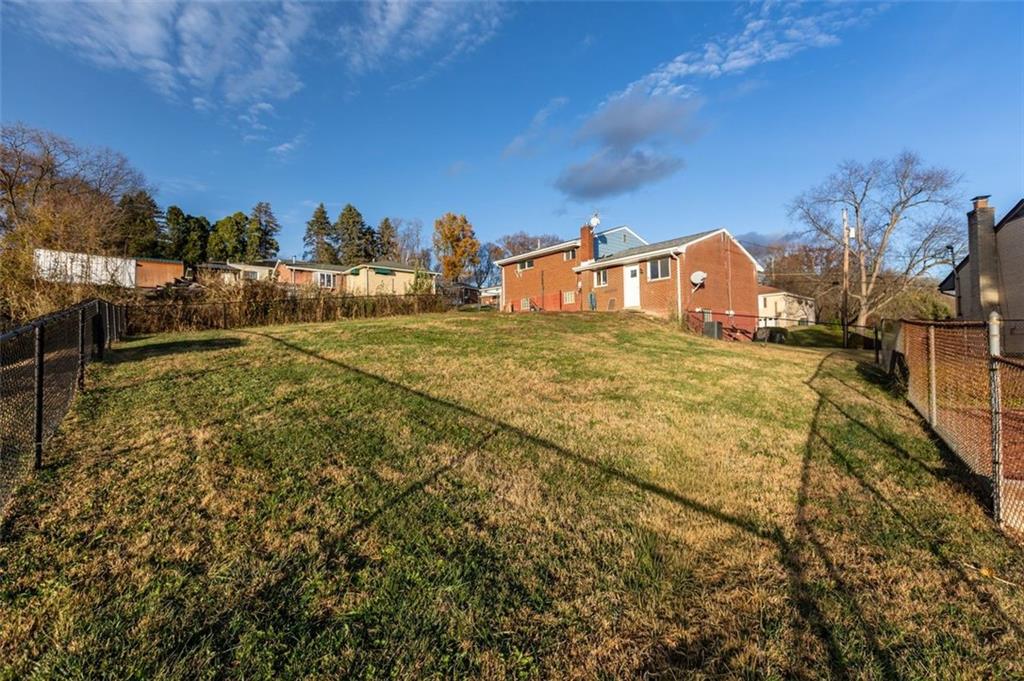1210 Linden Street Cheswick, PA 15024 - Photo 28 of 31 a view of a town with large trees and a big yard