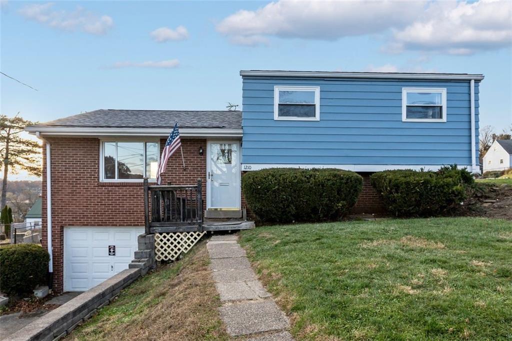 1210 Linden Street Cheswick, PA 15024 - Photo 30 of 31 a front view of a house with yard