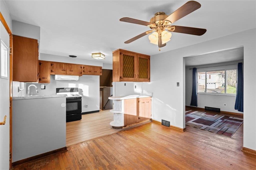 1210 Linden Street Cheswick, PA 15024 - Photo 5 of 31 a kitchen with a sink appliances and cabinets