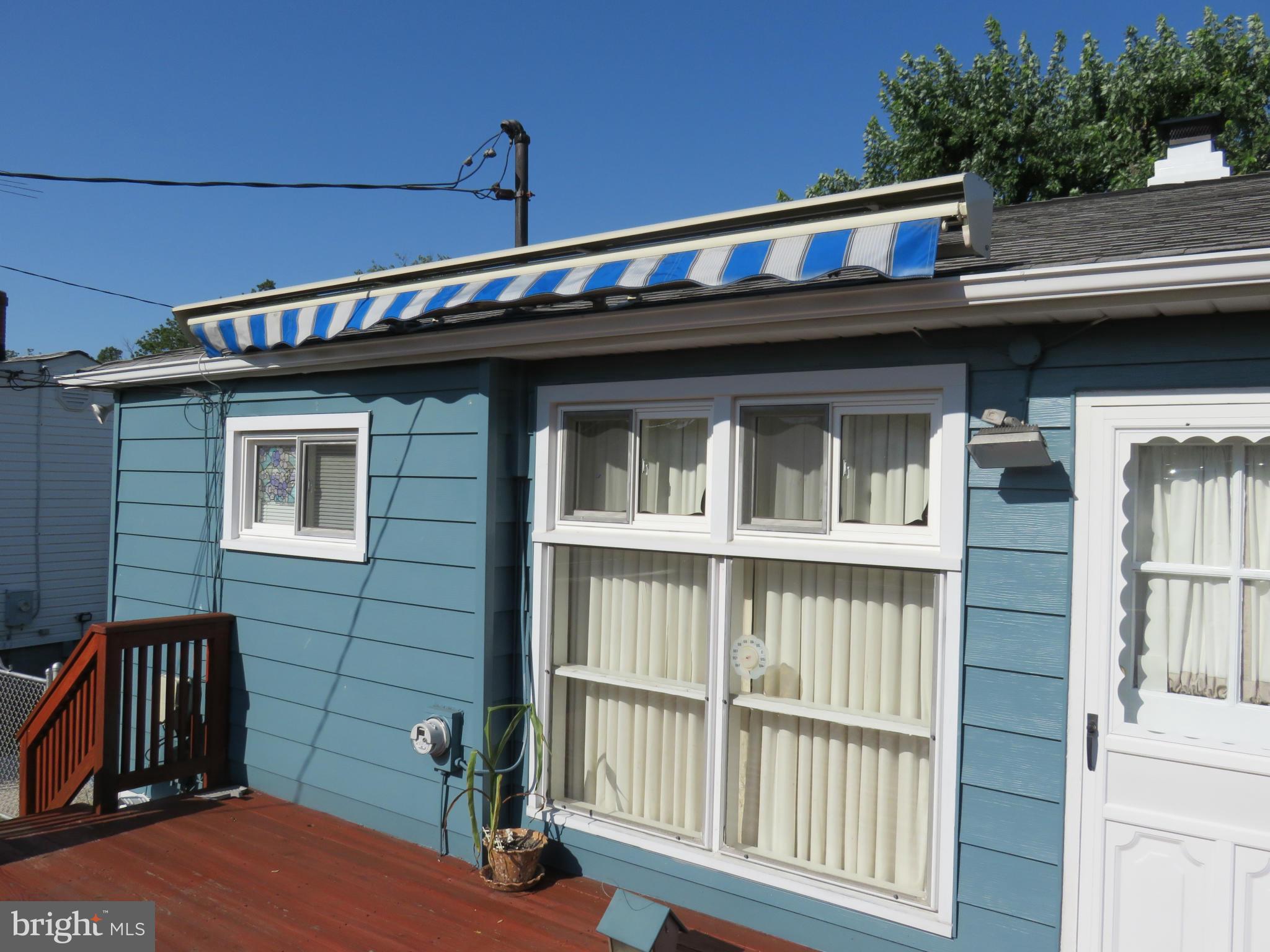 8815 Spring Road Baltimore, MD 21234 - Photo 23 of 30 Retractable Awning