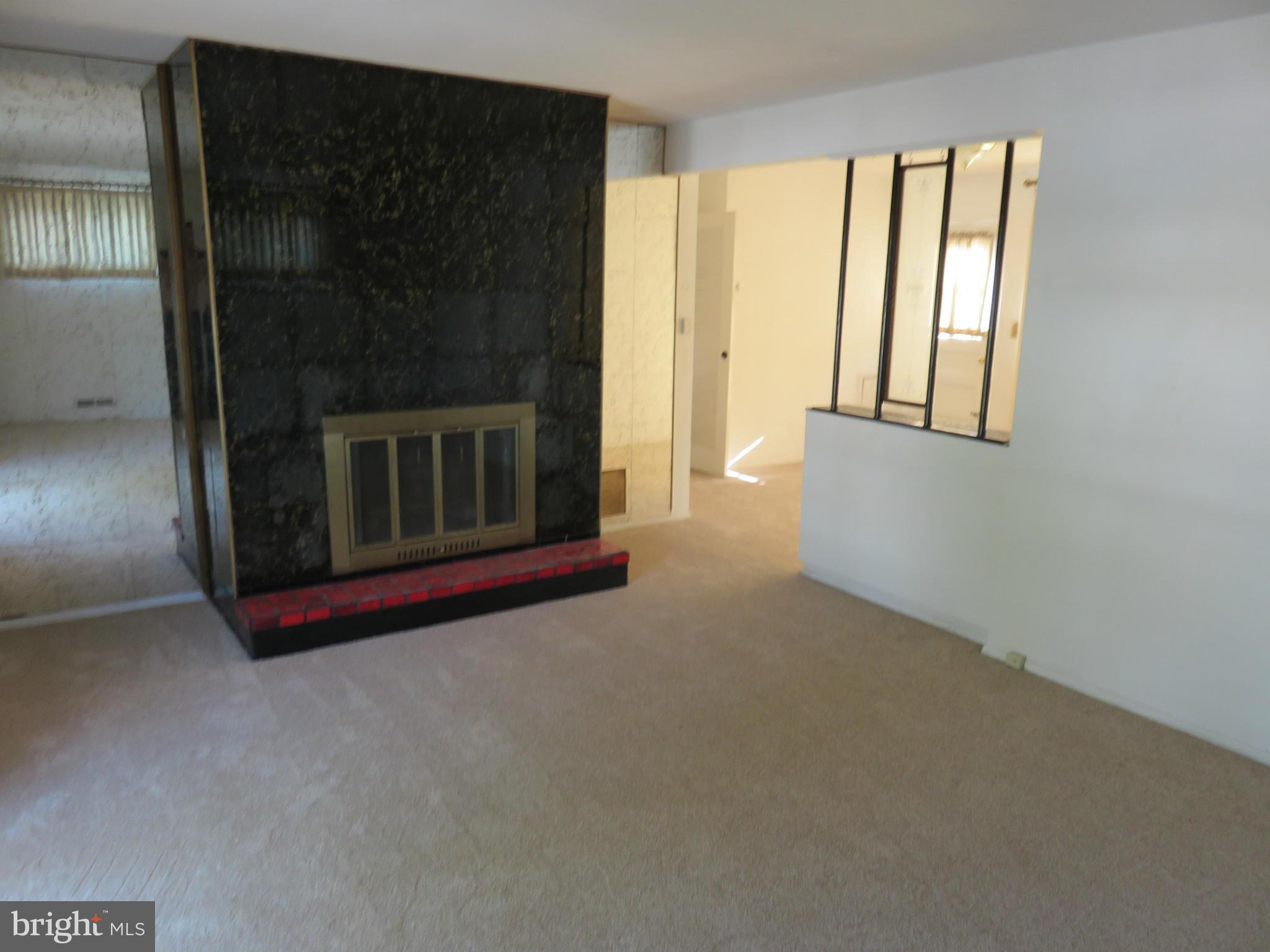 8815 Spring Road Baltimore, MD 21234 - Photo 5 of 30 Woodburning Fireplace
