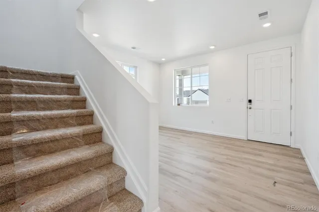 a view of entryway with stairs