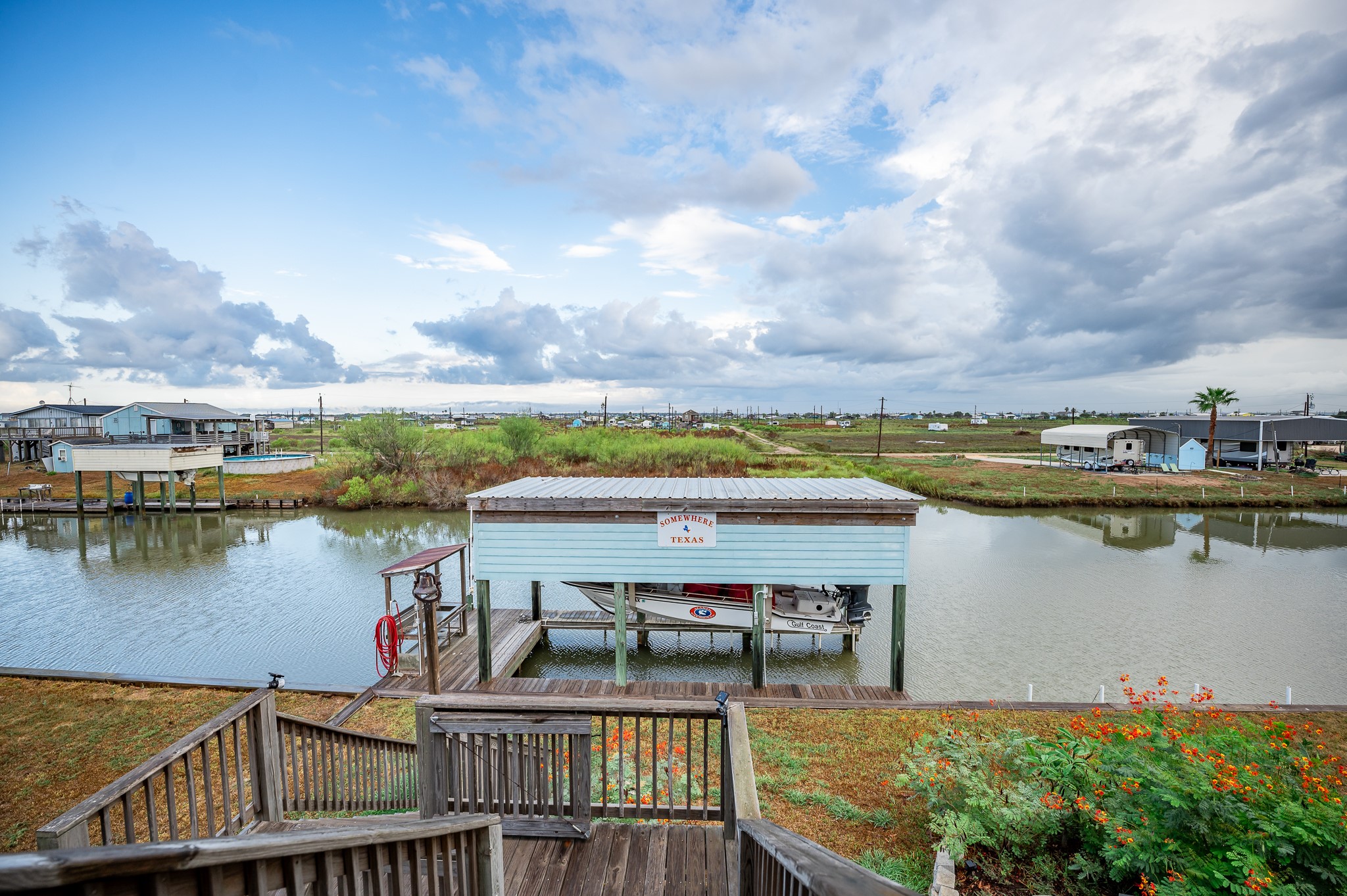 115 Albacore Street Sargent, TX 77414 - Photo 18 of 29 a view of a lake from a balcony