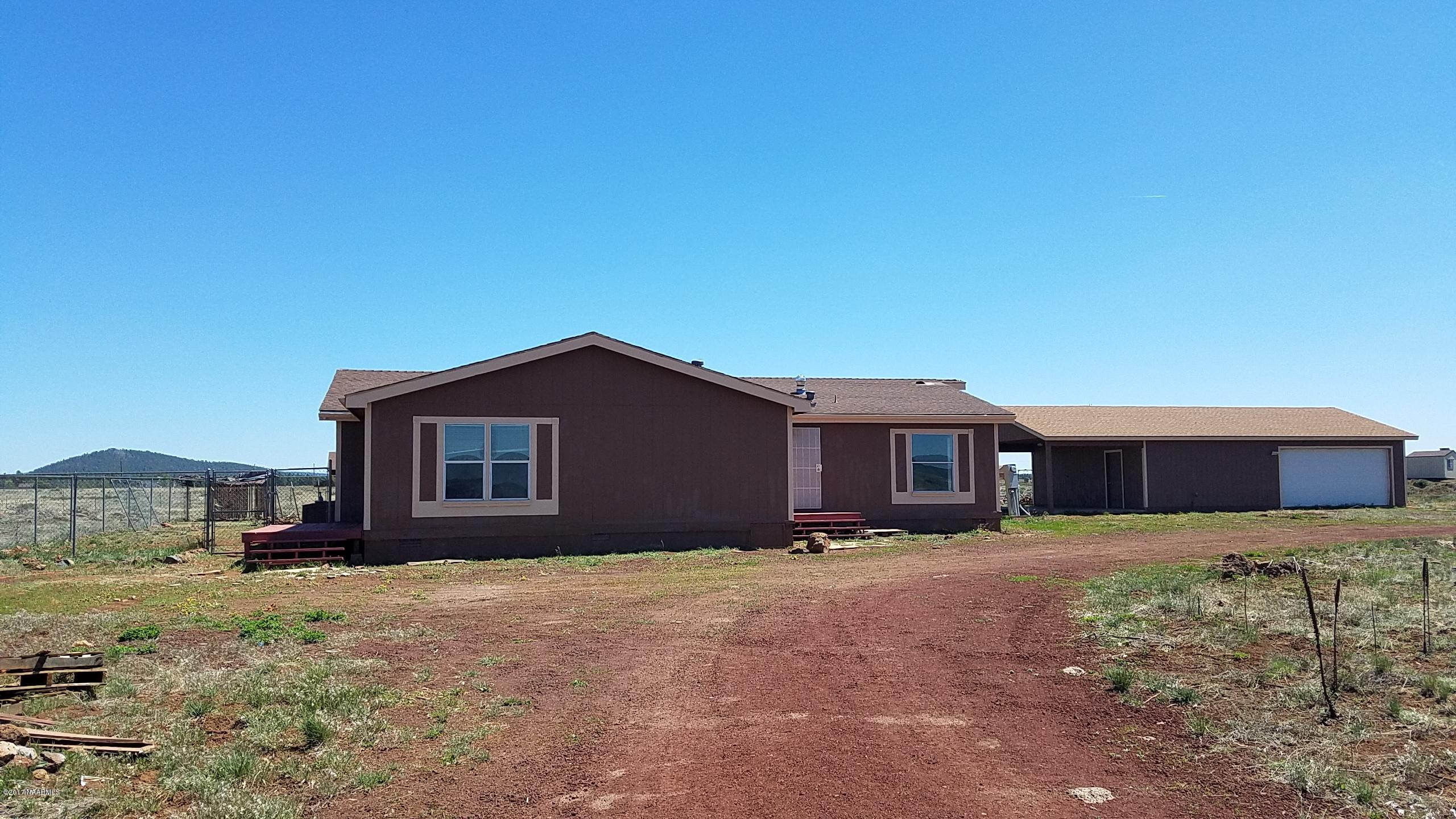 6193 Garland Prairie Road Parks, AZ 86005 - Photo 1 of 30 Front
