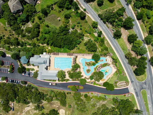 a view of a house with a yard and plants