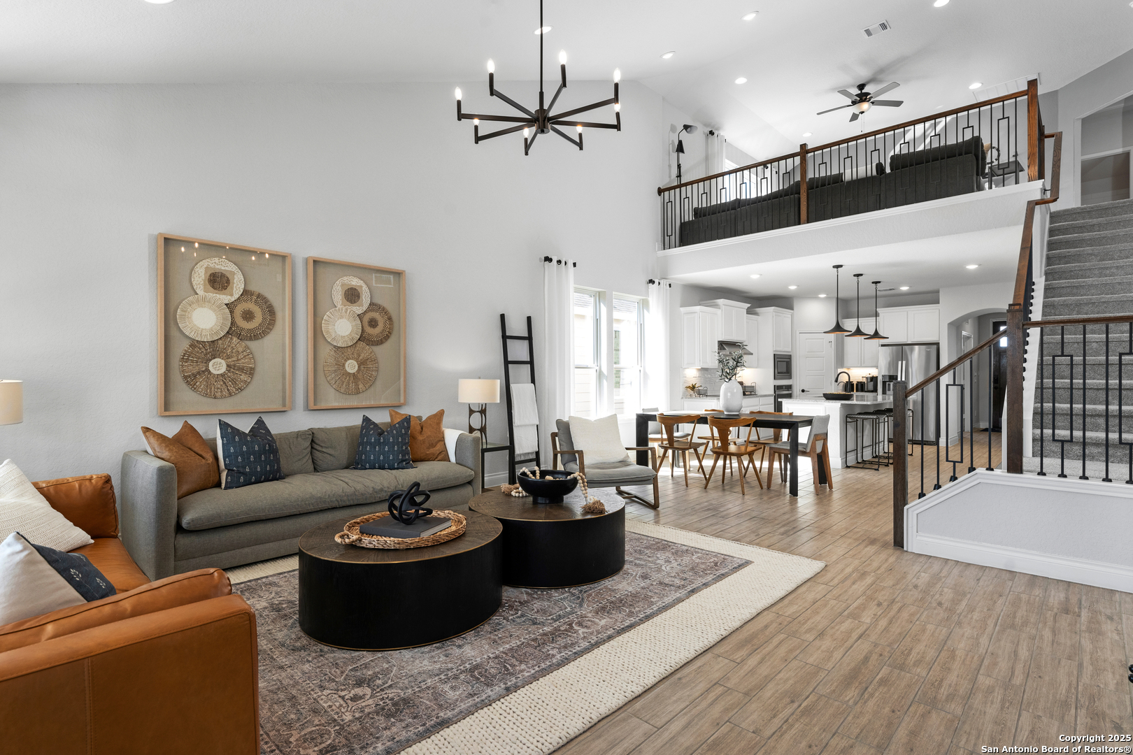 4036 Paddock Trail Seguin, TX 78155 - Photo 13 of 15 a living room with furniture kitchen view and a wooden floor