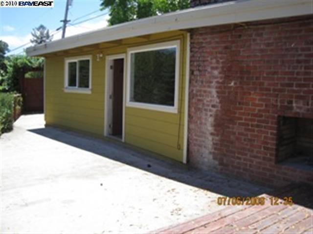 2 Marston Road Orinda, CA 94563 - Photo 1 of 1 a couple of potted plants in front of door