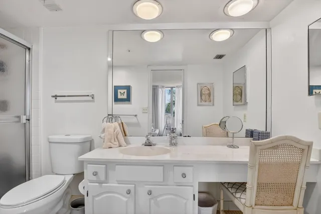 a bedroom with a bed and a walk in closet