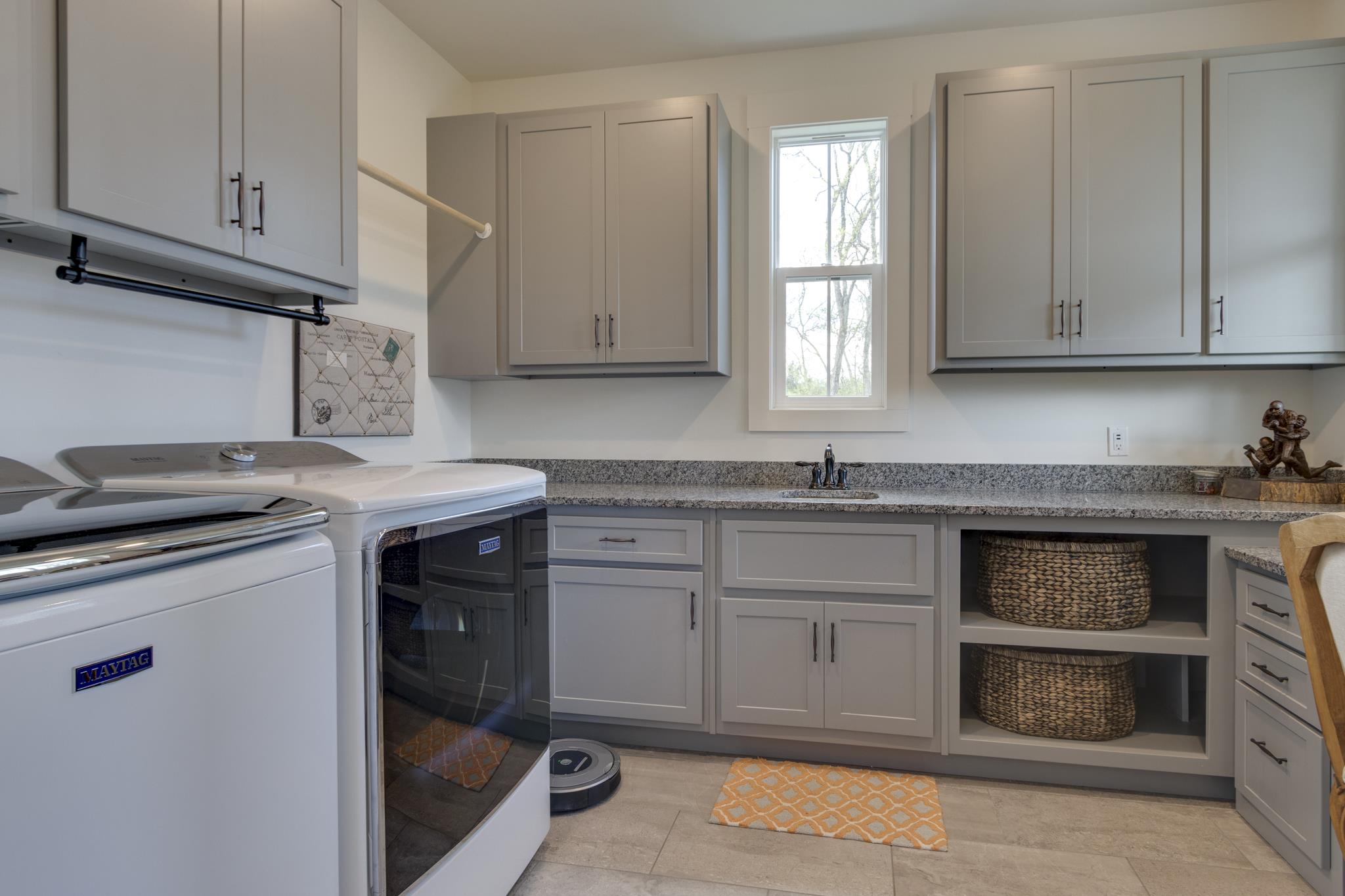 1024 Franklin Road Gallatin, TN 37066 - Photo 13 of 28 a kitchen with a sink stove and cabinets